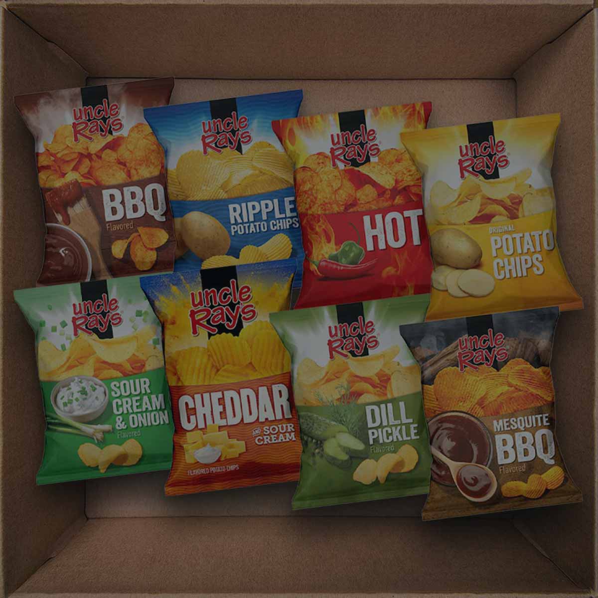Assorted packages of Uncle Ray's potato chips in a cardboard box.