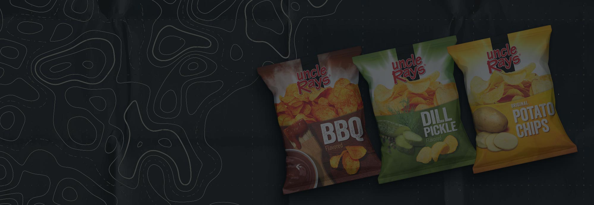 Three bags of Uncle Ray's potato chips with different flavors on a dark background